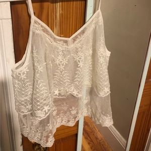 See through cream colored tank